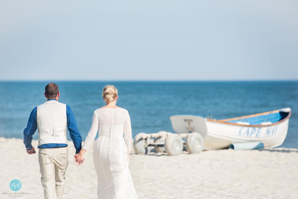 Long sleeves on the beach! Not one complaint from this gorgeous bride.