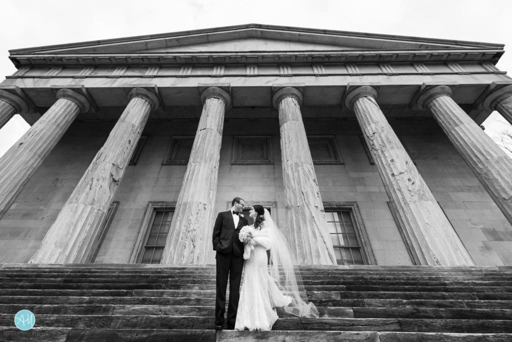 bride and groom on the steps of the second bank of the united states philadelphia