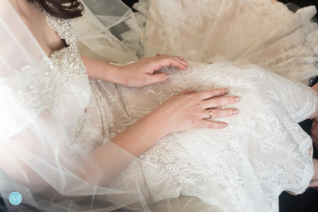 bride's manicure matches her champagne gown