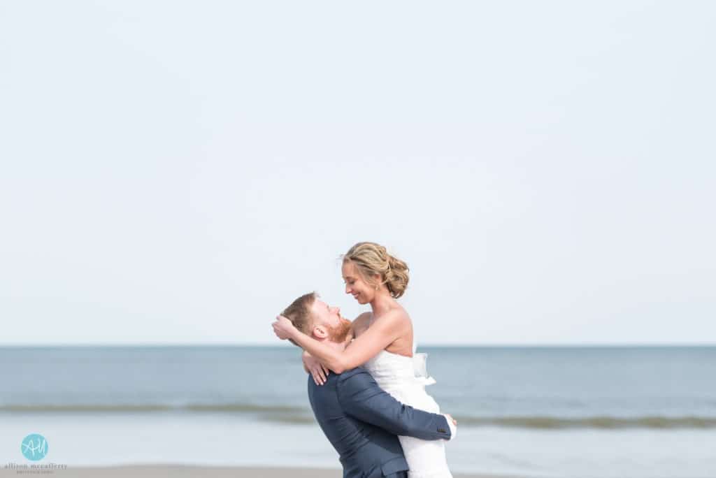 bride and groom on beach after wedding