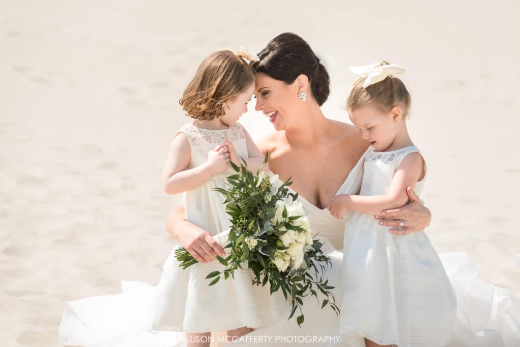 Flower girls and bride on beach in Cape May