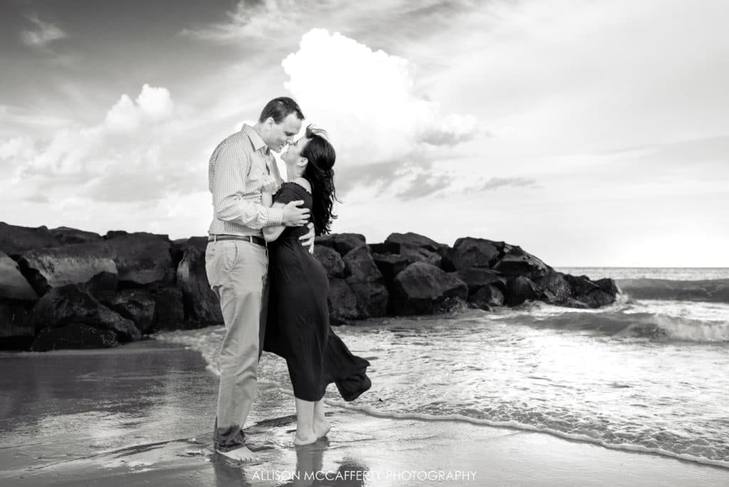 black and white beach engagement photo