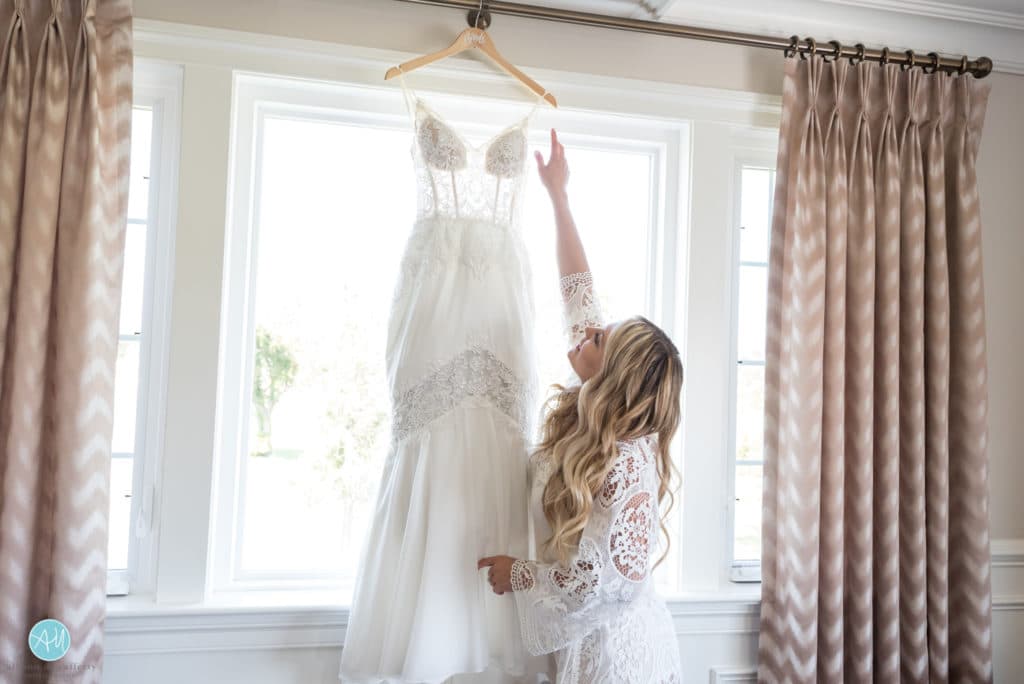Wedding gown hanging in the Atlantic City Country Club bridal suite