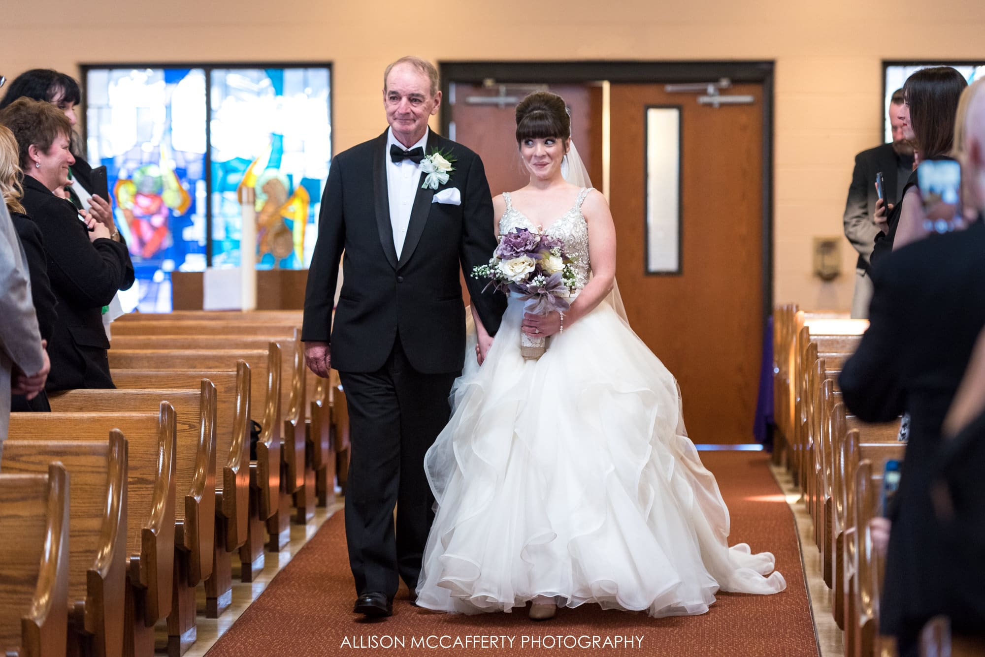 Bride walking down the aisle with her Dad