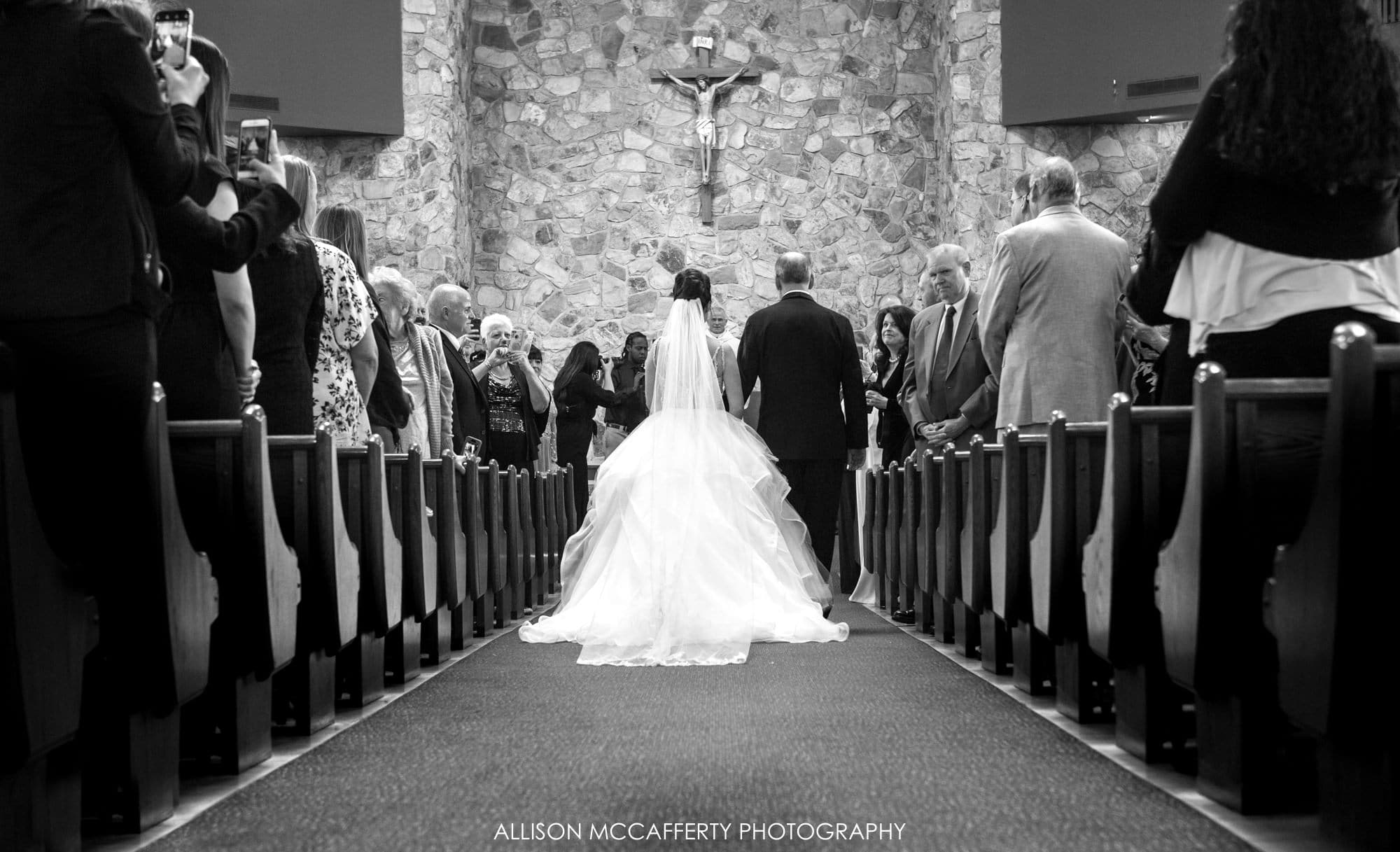 Black and white photo of the church during a wedding