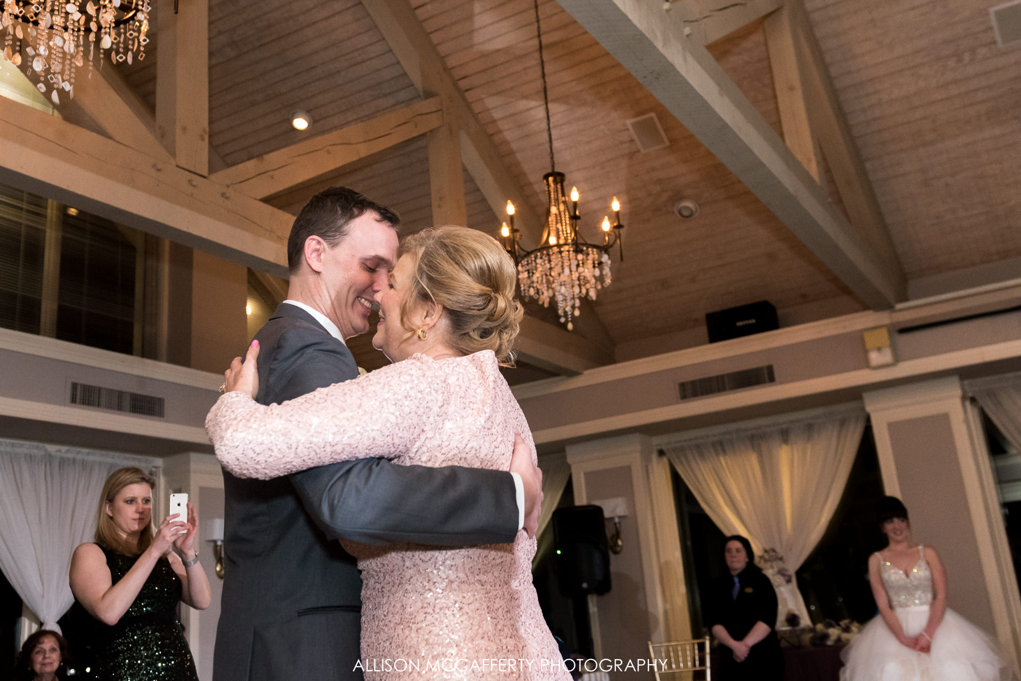 Groom dancing with his Mom at his wedding