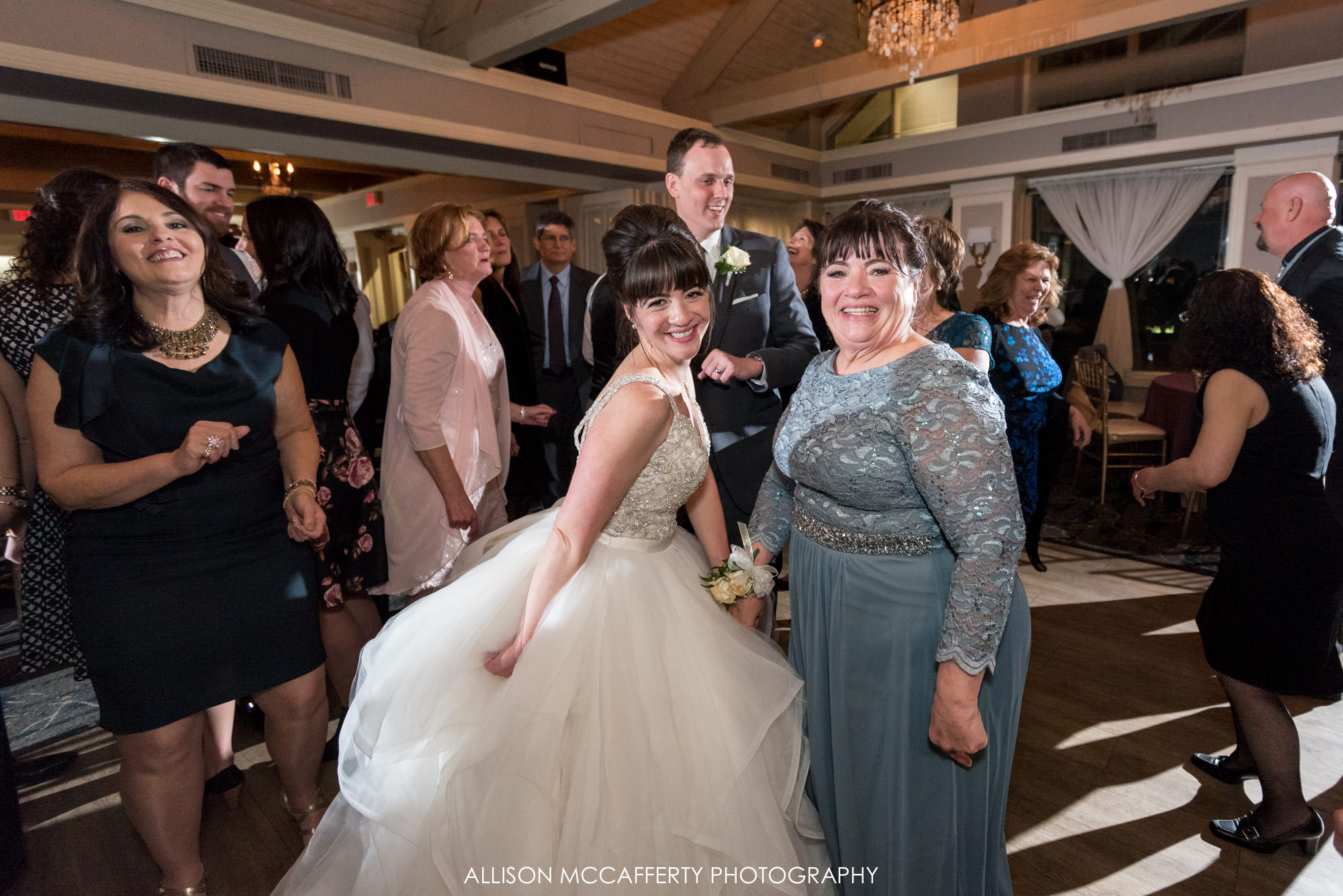 Bride and her Mom on the dance floor during a wedding