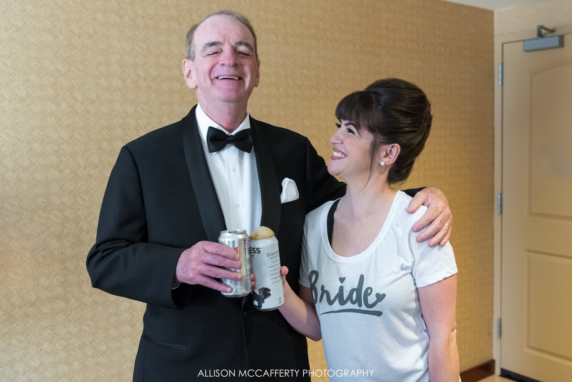 Bride and her Dad having a beer before the wedding