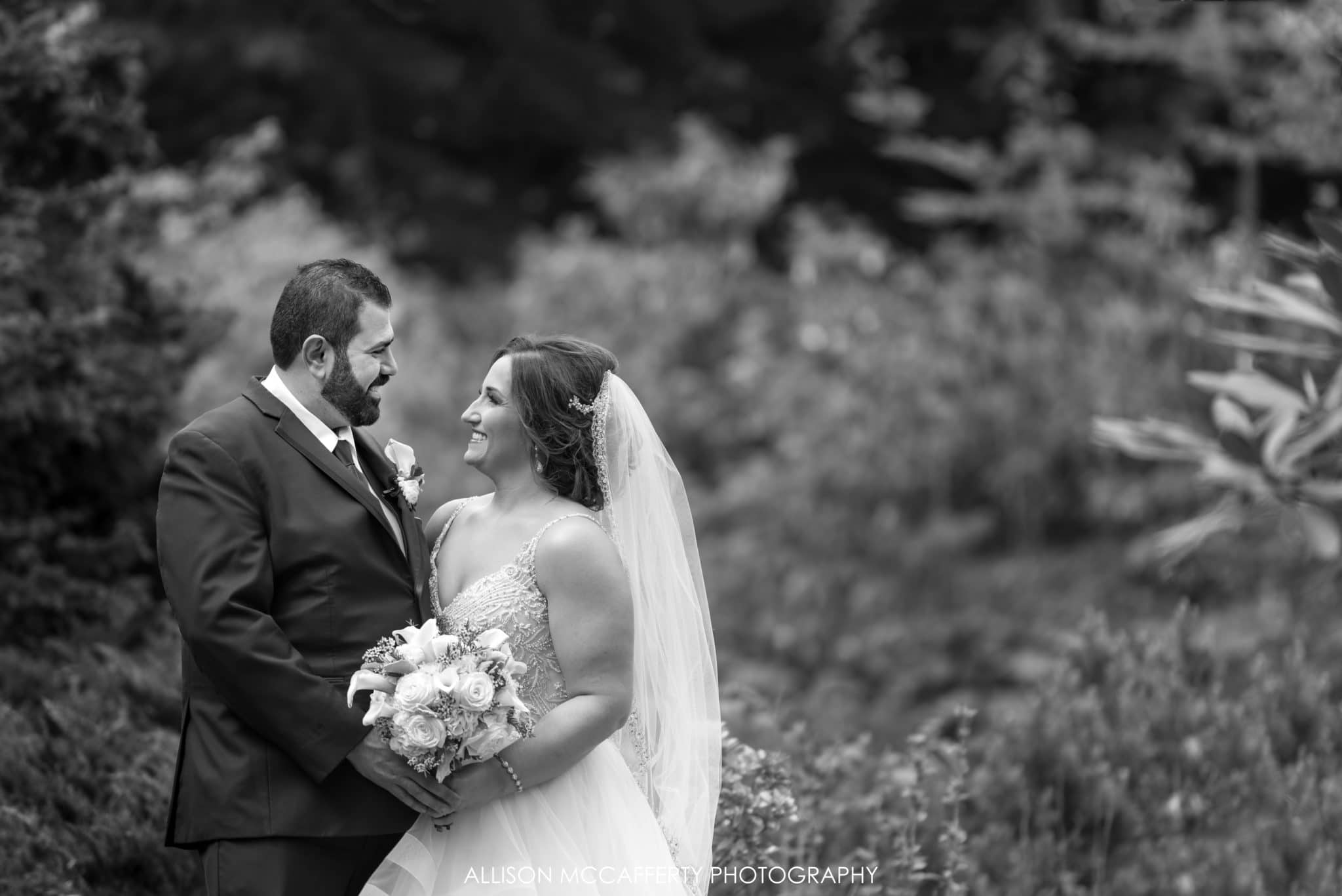 black and white portrait of wedding at Reeves-Reed Arboretum