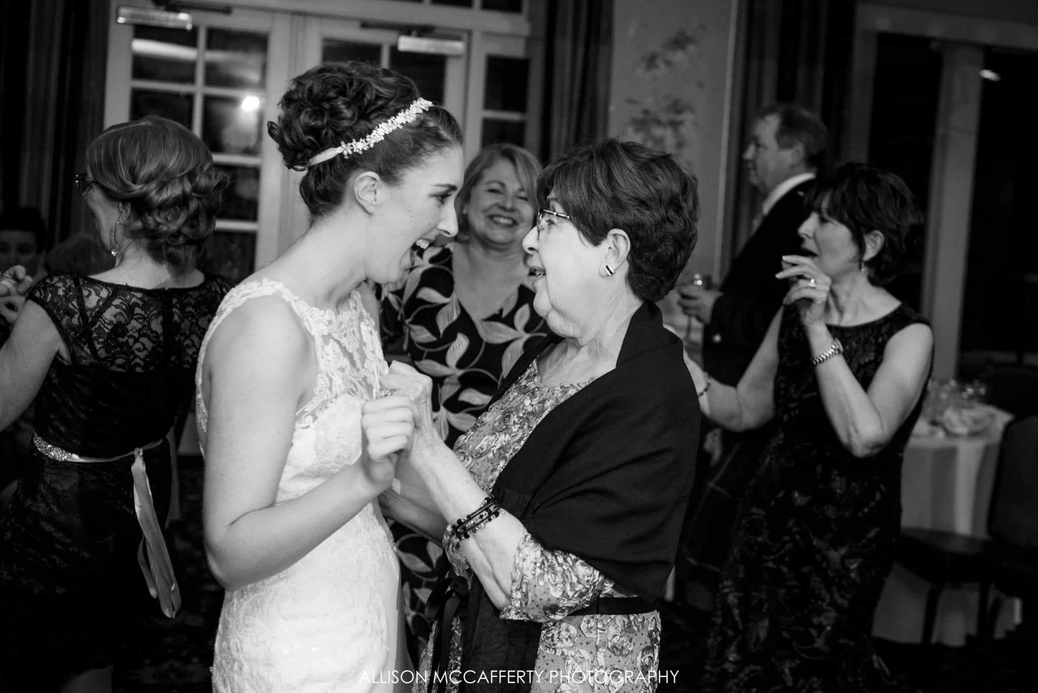 Bride and her grandmother dancing
