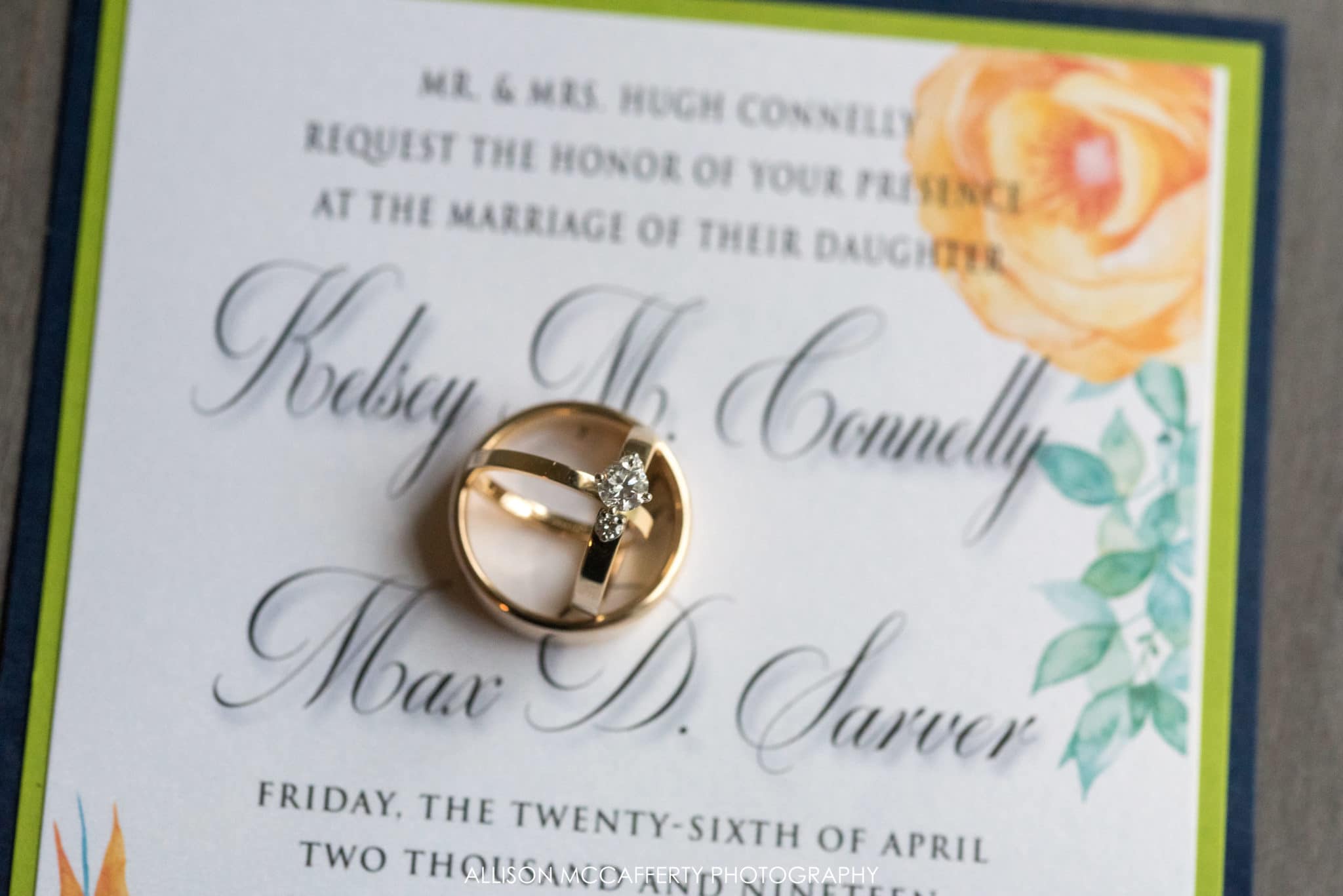 Wedding rings on invitation
