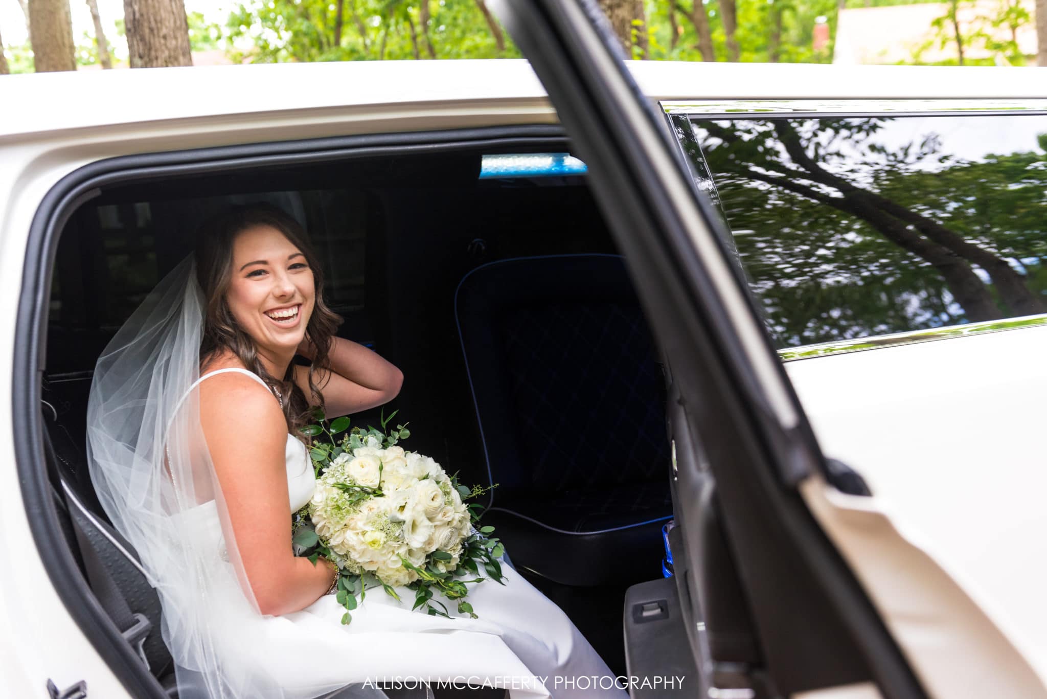 bride in limo before leaving for ceremony