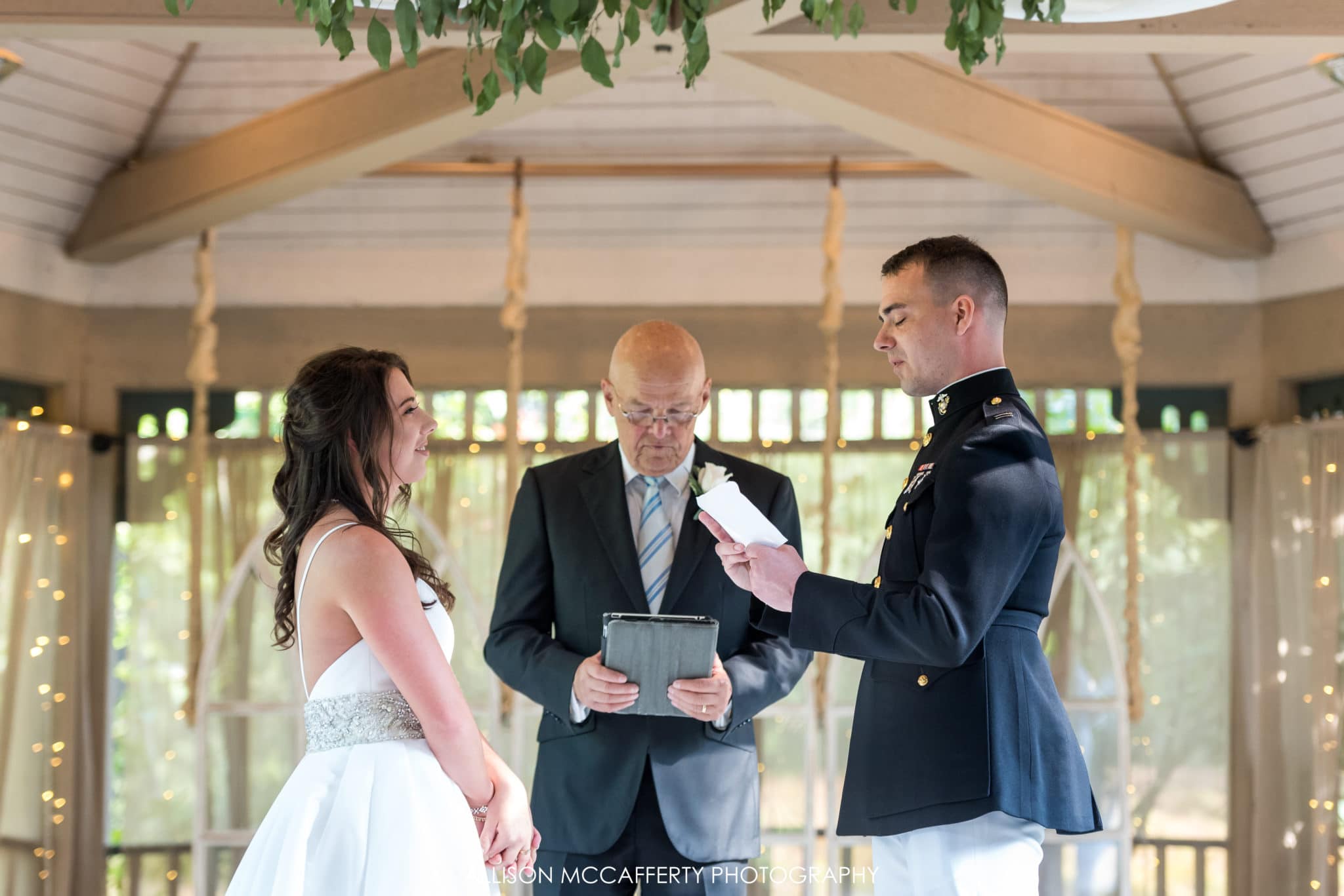 exchanging vows at the ceremony at Scotland Run