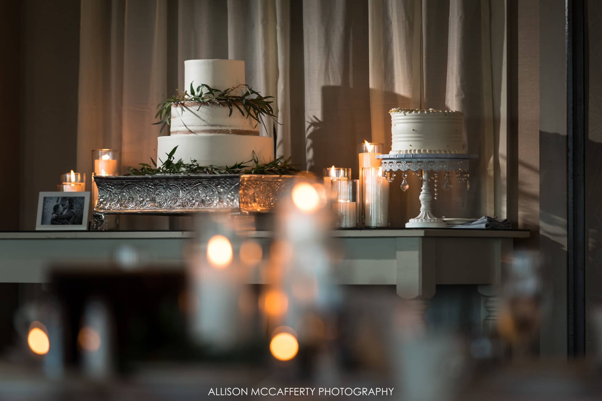 candles and wedding cake display