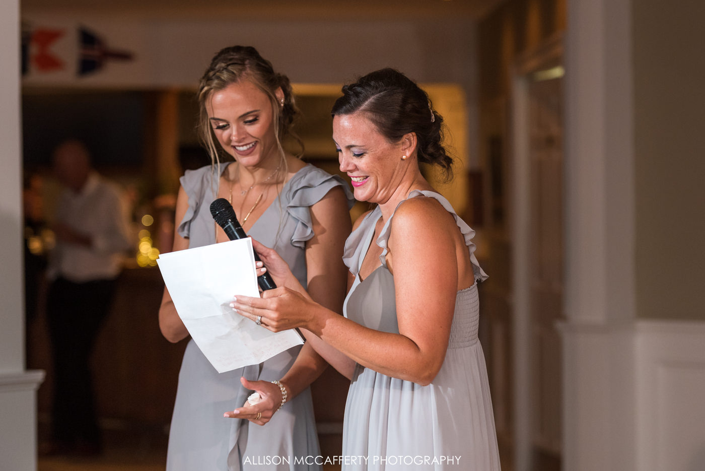 Maid and Matron of honor speaking during a wedding