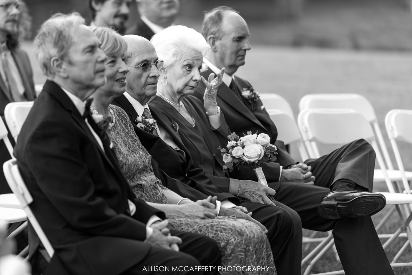 black and white photo of relative crying at wedding ceremony