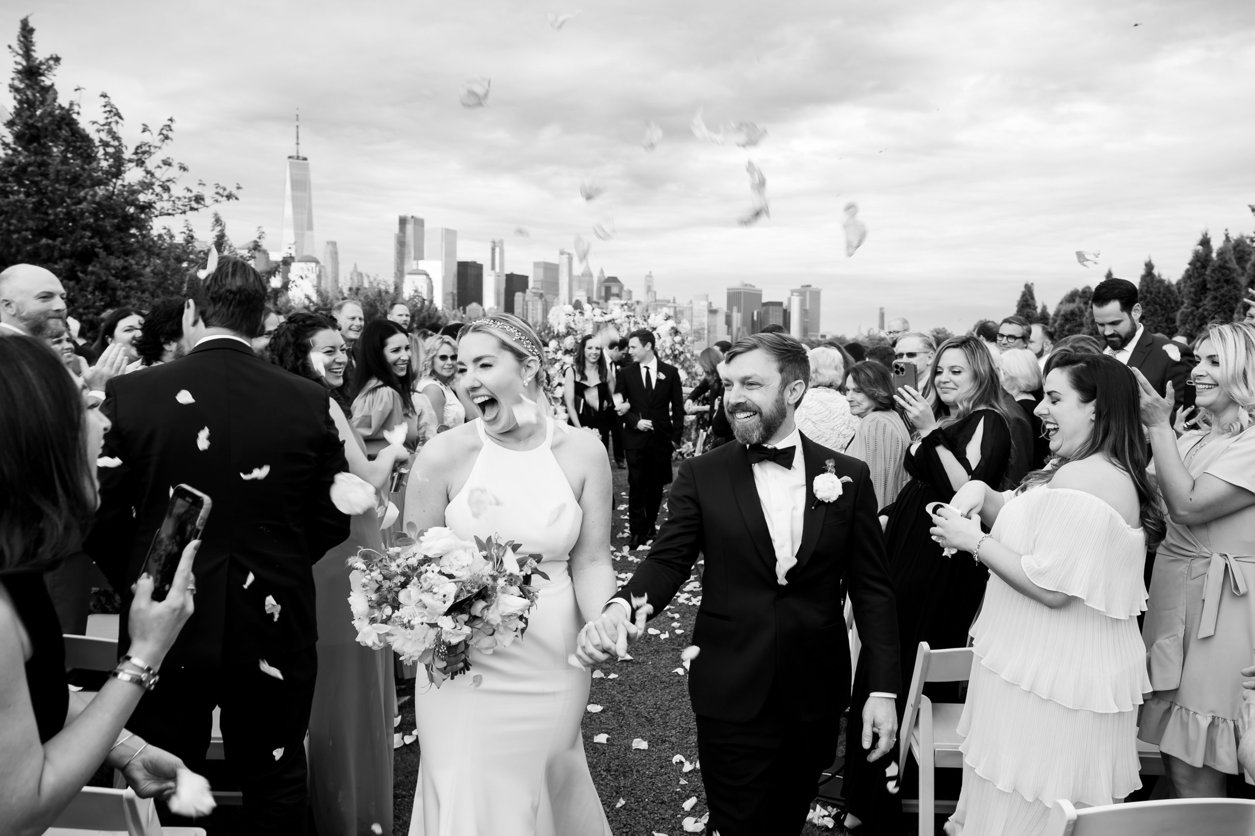 Black and white photo of a couple who got married outside of Liberty House in Jersey City NJ