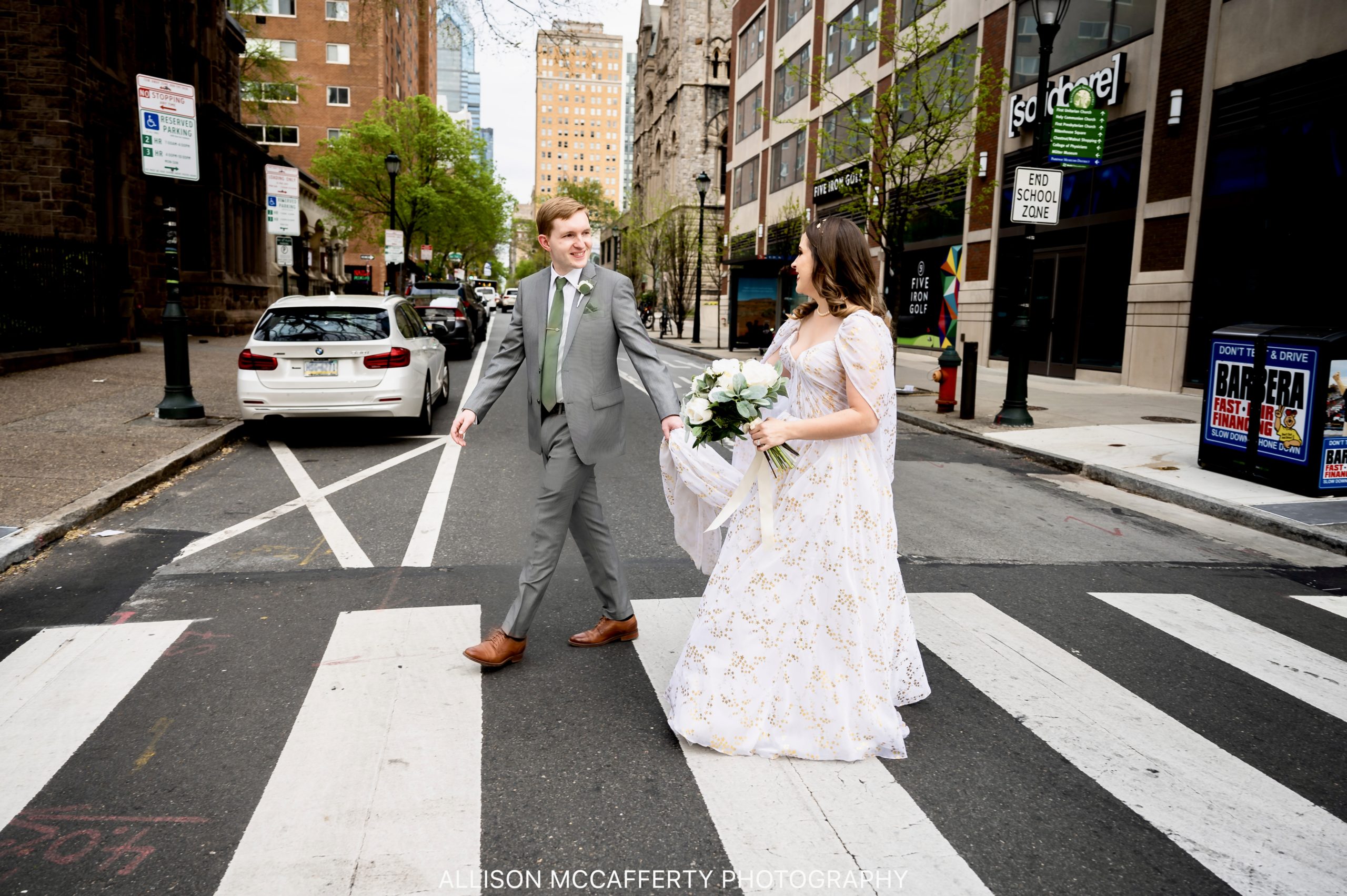 Photo of a couple walking from their wedding ceremony to their wedding reception at The College of Physicians of Philadelphia