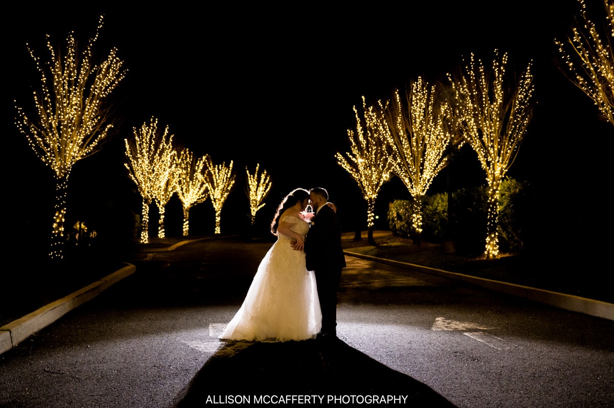 Night wedding photo outside the Mill Lakeside Manor