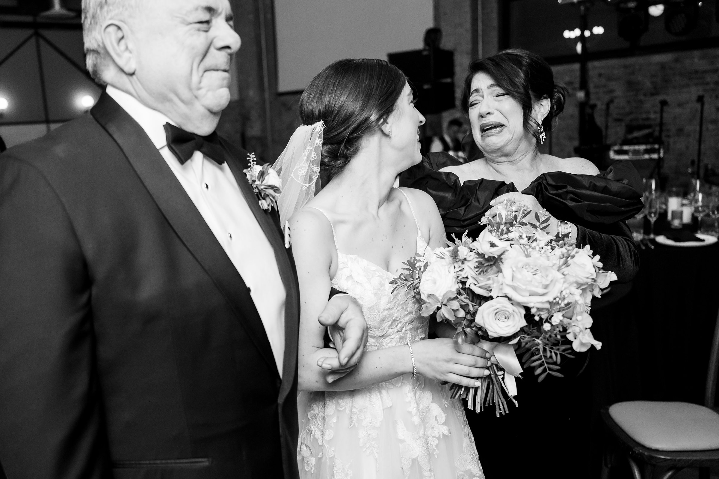 At a Lilah wedding, the bride walks down the aisle with her father.