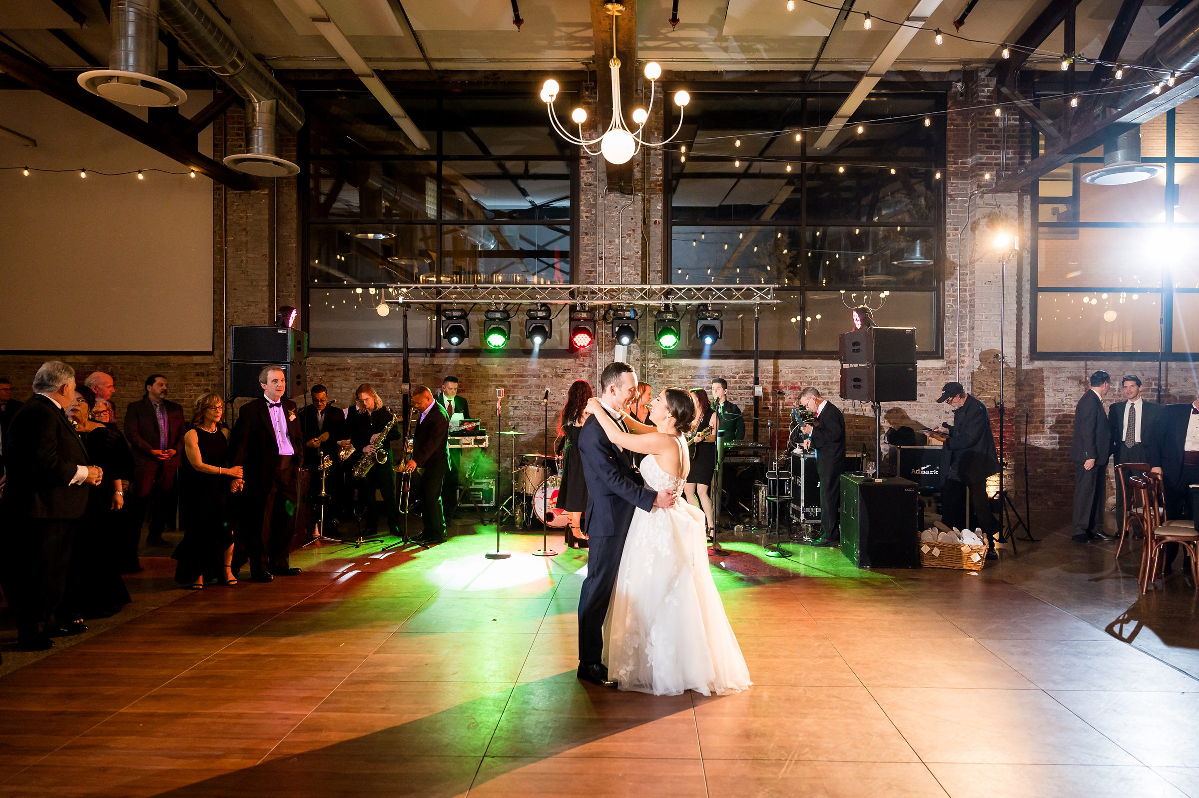 At a Lilah Events wedding, the bride and groom share their first dance at the reception.