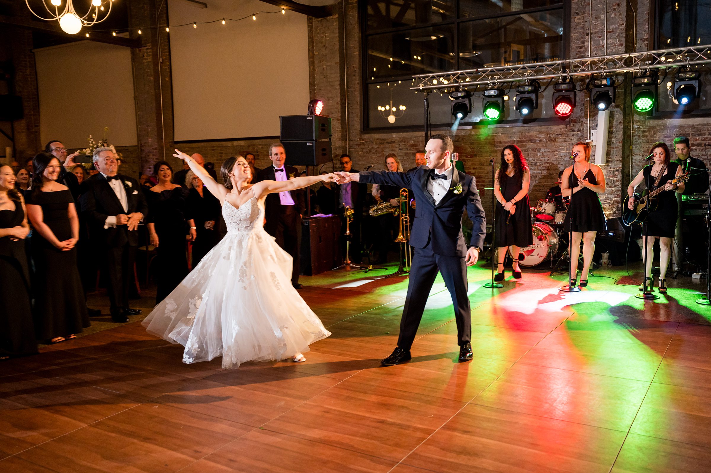 At a Lilah wedding event, the bride and groom share a special dance on the dance floor during their reception.