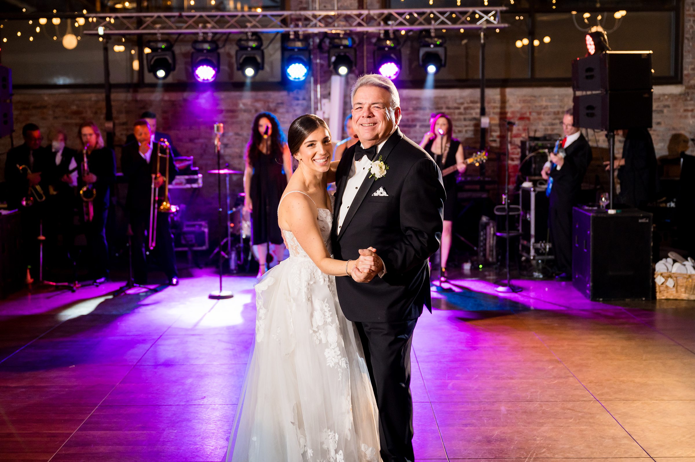 The bride and groom share their first dance at a Lilah Events wedding reception.
