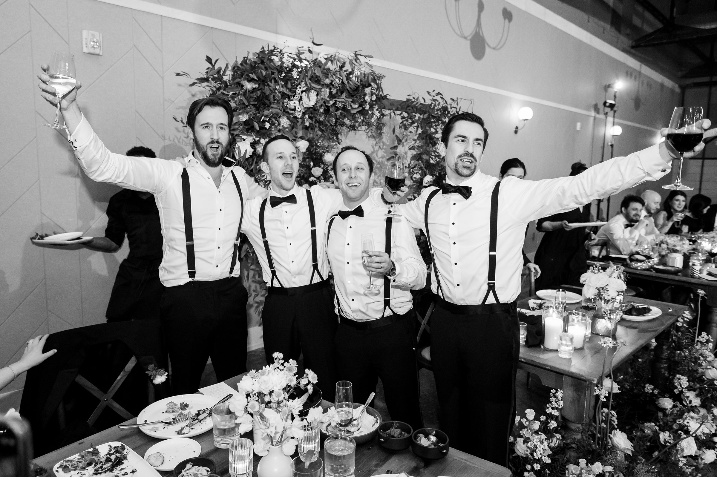 A black and white photo of a group of groomsmen at a Lilah Events wedding.