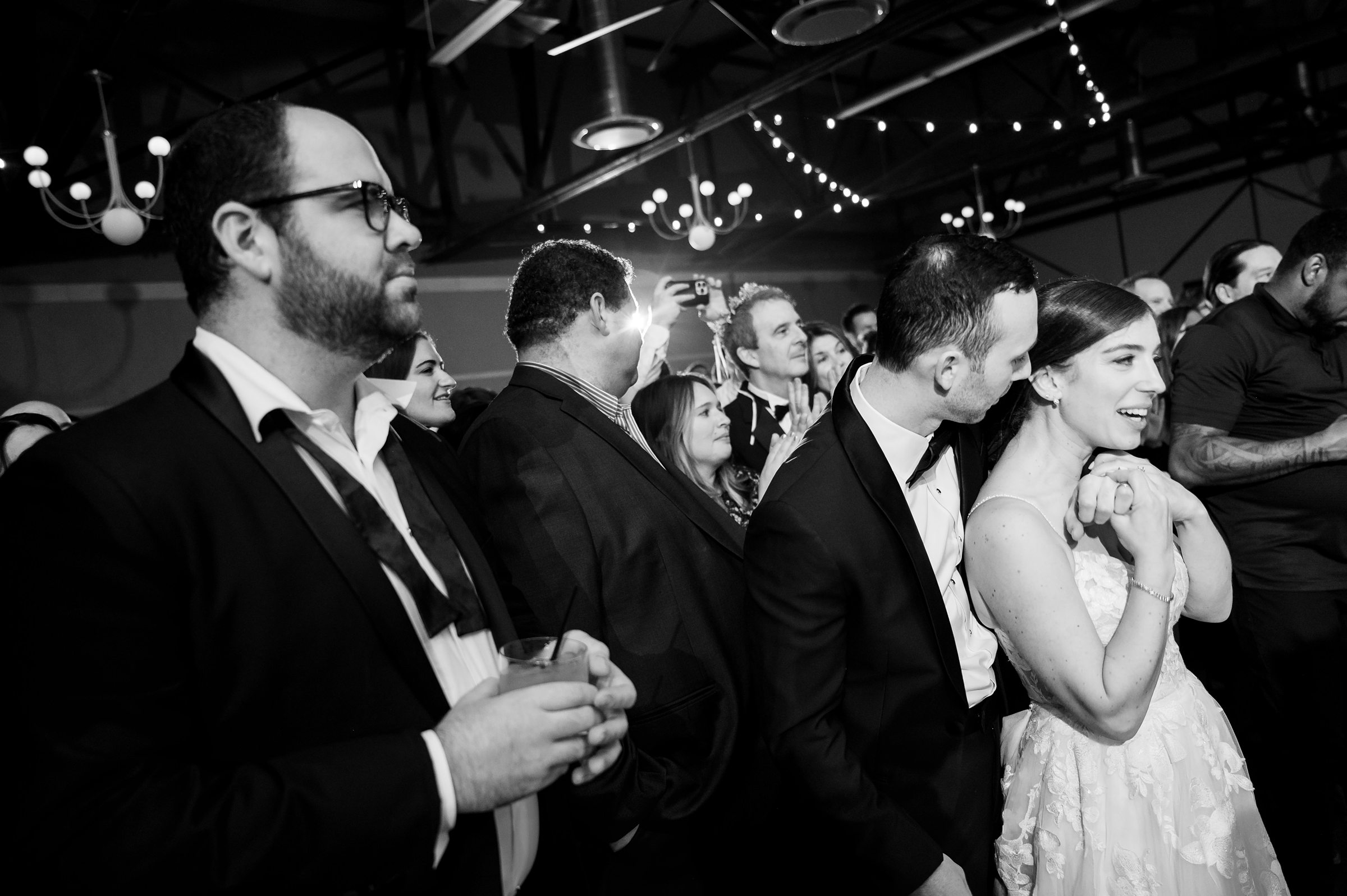 At a Lilah Events wedding, the bride and groom are joyfully dancing at their reception.