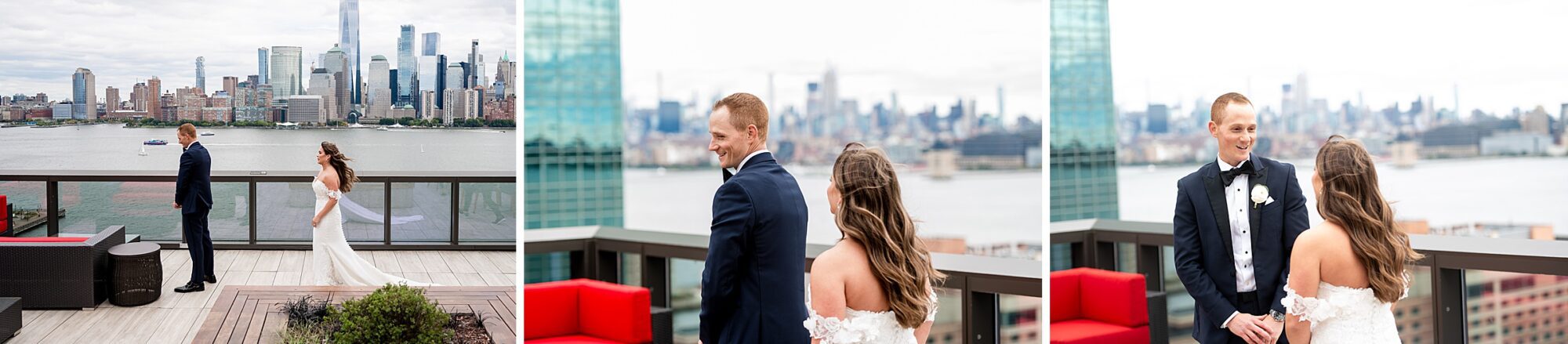 A bride and groom standing on a balcony with a view of the city.