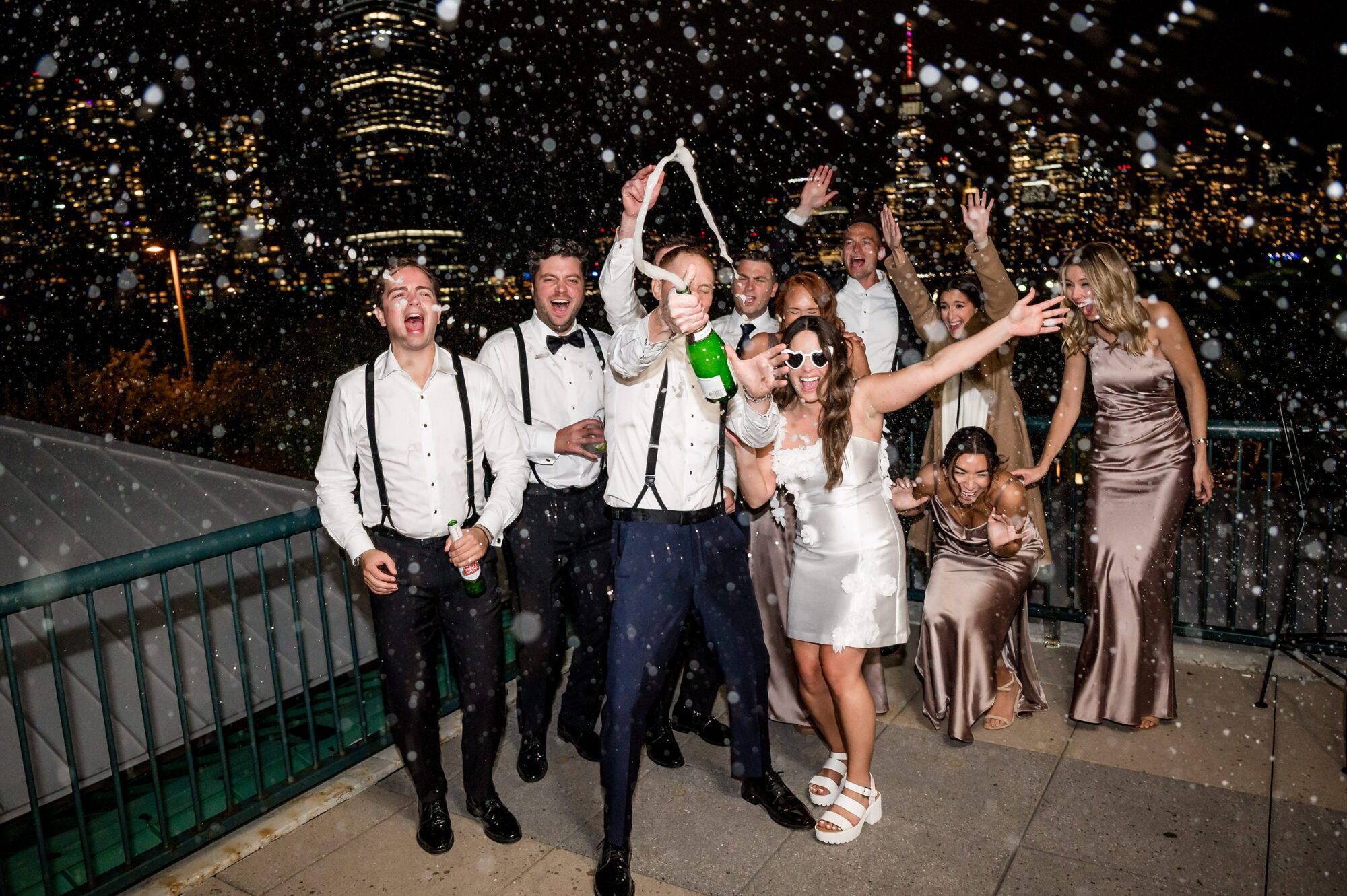 A wedding party at Liberty House celebrating with champagne.