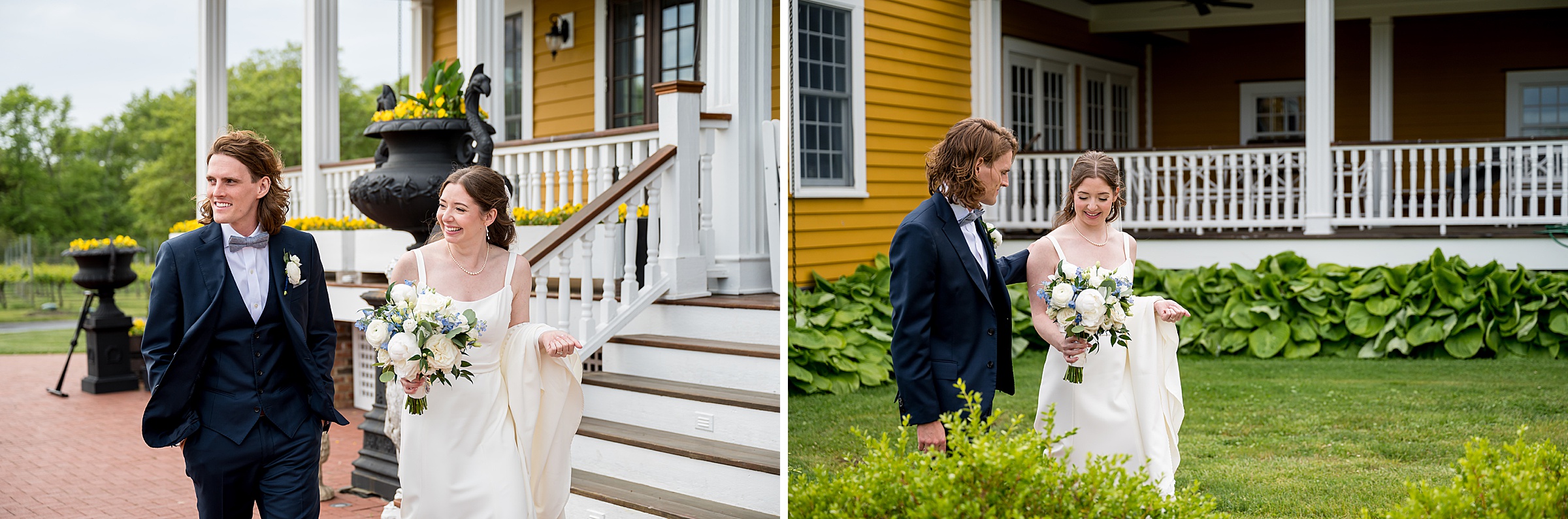 A wedding couple walks outdoors; the groom wears a dark suit and the bride carries a bouquet. They are beside a yellow house with white trim and a porch with greenery in the background.